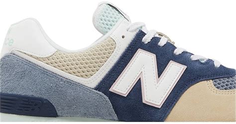 new balance men's 574 rugged blue/beige