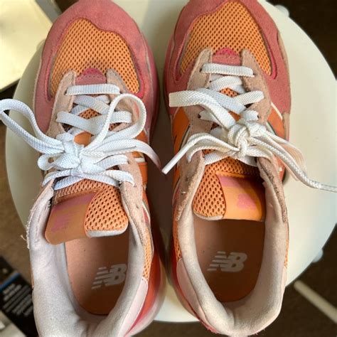 new balance pink and orange sneakers