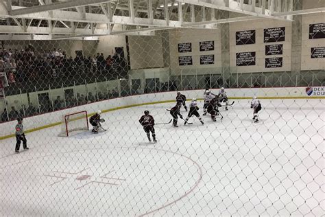 new england college hockey schedule