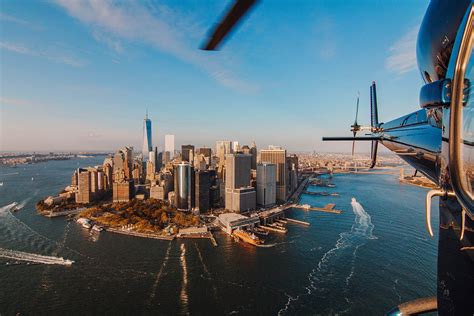 Aerial view of the city with the East River and the Brooklyn Bridge from a helicopter