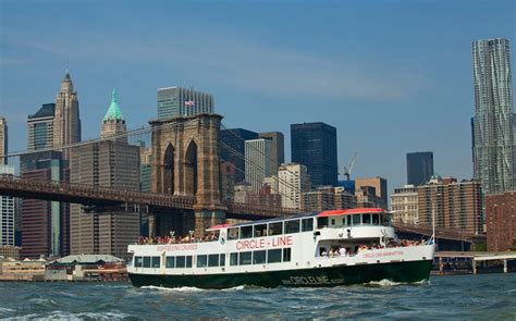 A harbor cruise with views of the Statue of Liberty, Ellis Island, and the Brooklyn Bridge.