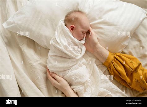 Newborn Swaddle While Sleeping