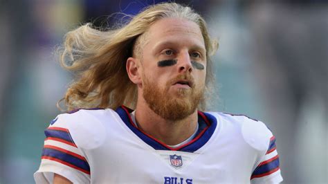 nfl player with long blonde hair