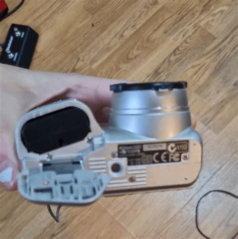 Nikon D3000 Battery Stuck