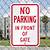 no parking in front of gate sign