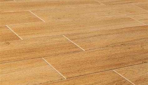 Love this tile plank flooring. Perfect color for weathered oak look