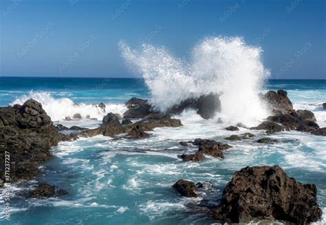Ocean waves crashing on rocks