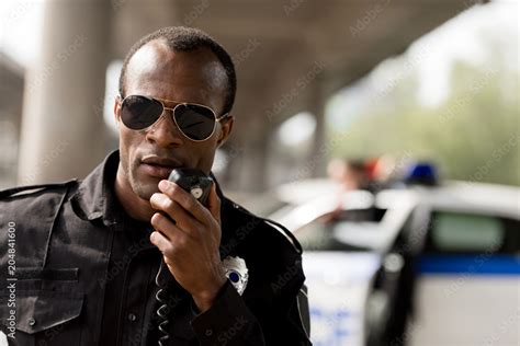 officer talking on radio