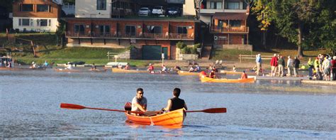 Senior Man Paddling A Small Canoe On The Moose River. Stock Photo