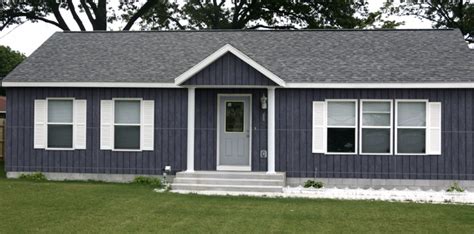 one level houses with blue siding