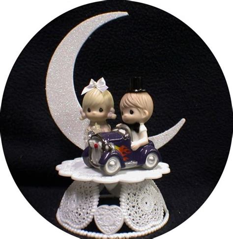 one of a kind wedding cake toppers
