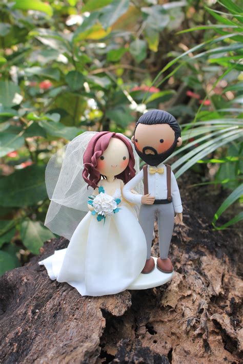 one of a kind wedding cake toppers
