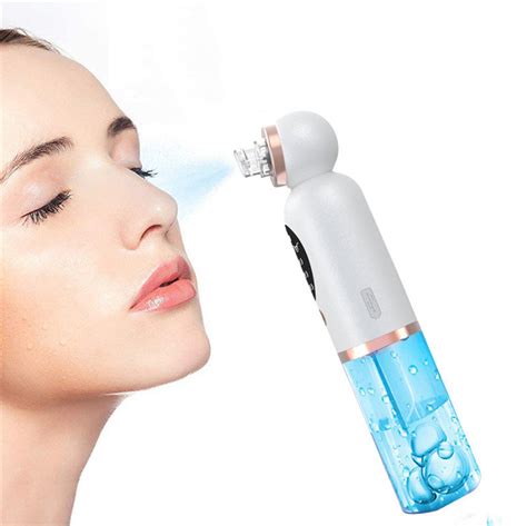 one or two mini electric pore cleansing blackhead vacuums