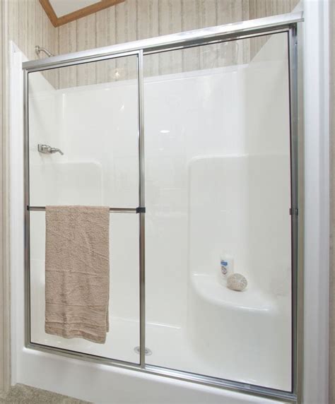 one piece fiberglass shower with pocket doors