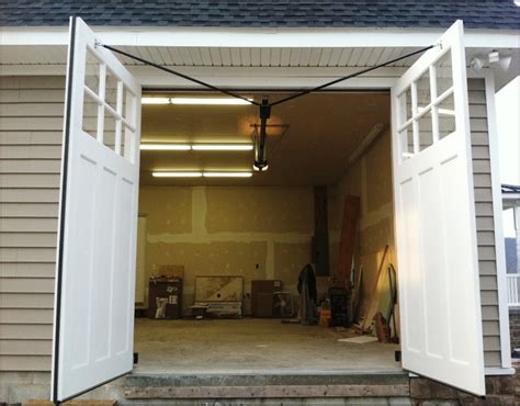 one piece swing up garage doors