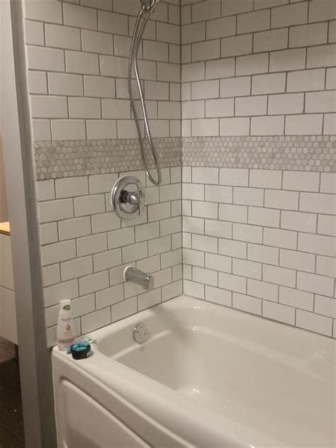 one piece tub surround vs tile
