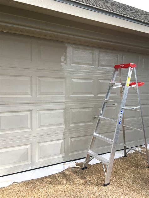 one side of garage door gets to ground first