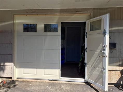 one side of garage door higher