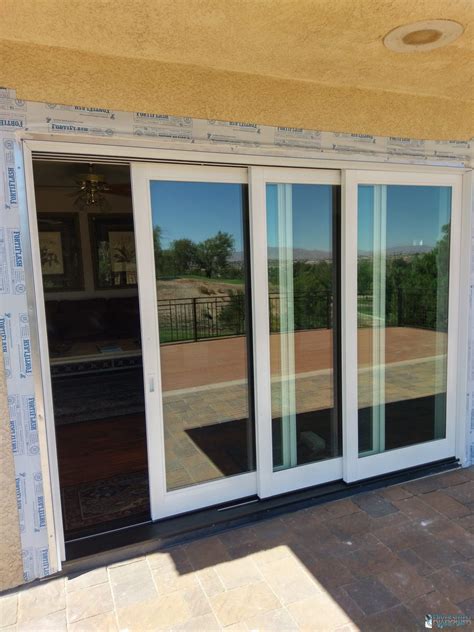 one sliding doors that opens fron livng room to patio