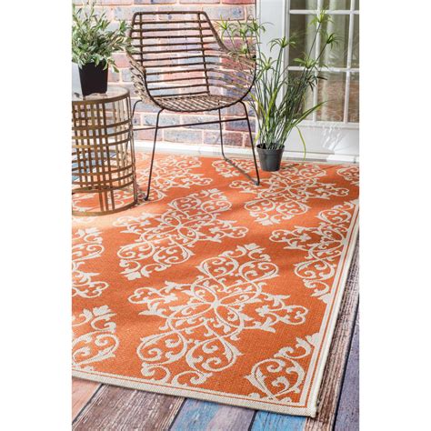 home.furnitureanddecorny.com:orange circle area rug