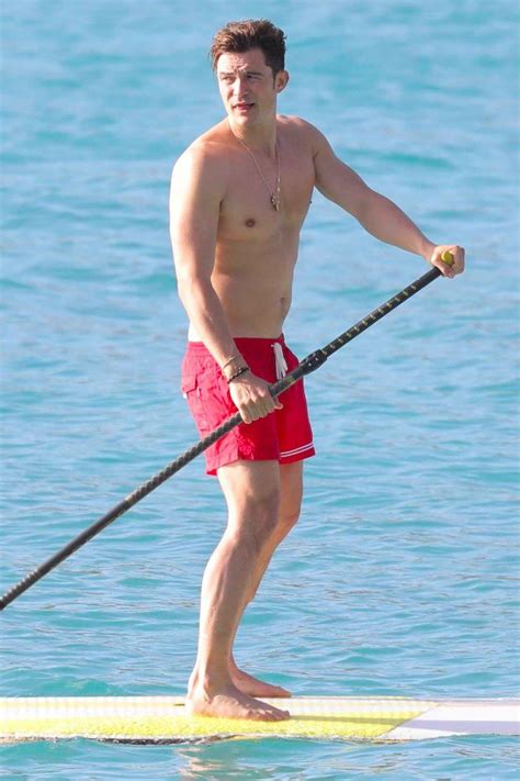 orlando bloom photos paddle boarding