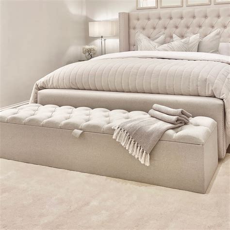 Neutral Transitional Master Bedroom With Round Ottoman HGTV