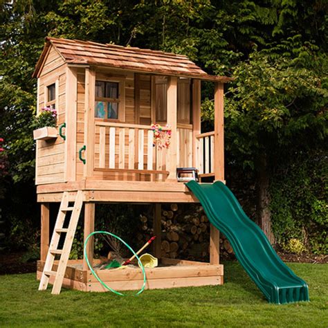 outdoor wooden playhouse with slide