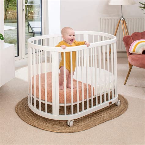 Oval Baby Cot Bed