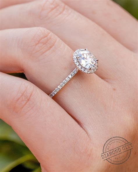 oval cushion cut halo engagement rings