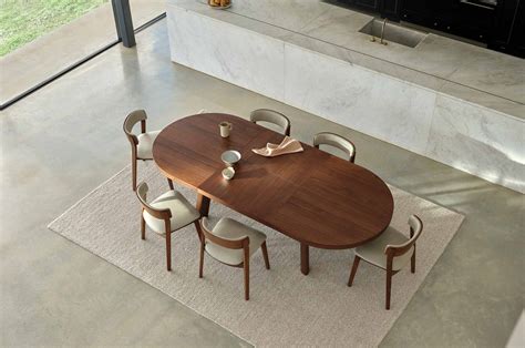 oval extendable dining table seats 8