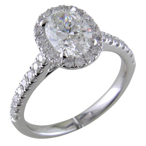 oval halo engagement rings platinum