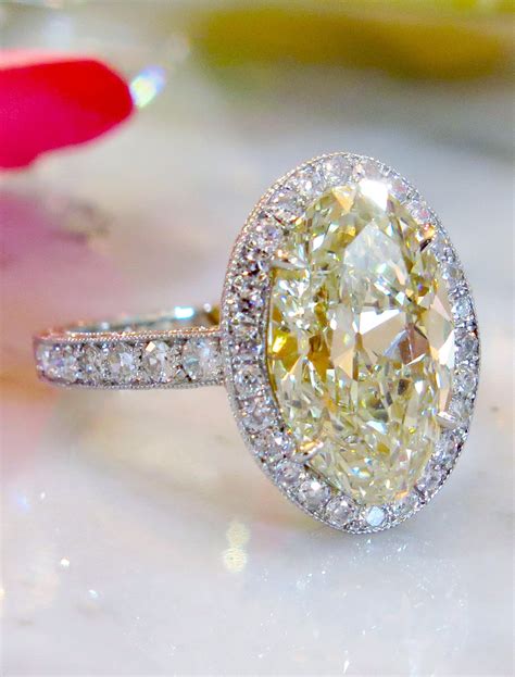 oval yellow diamond engagement rings