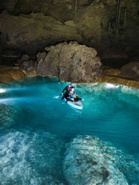 paddleboarding inside caves