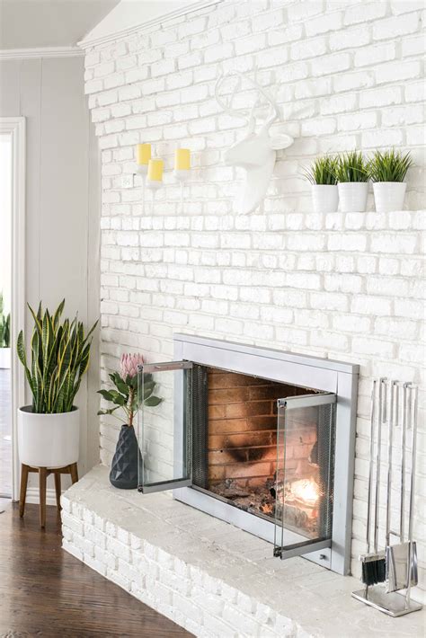 A white painted fireplace gives a modern facelift to this midcentury