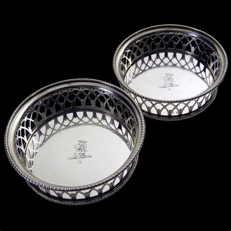 pair of sterling silver wine coasters