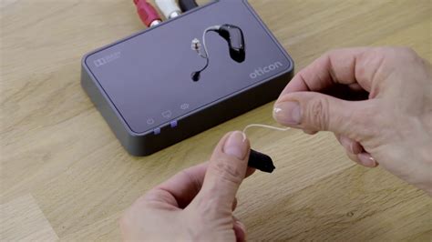How to pair Oticon EduMic with hearing aids with rechargeable batteries