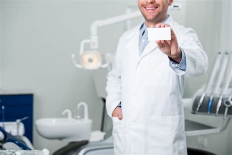 A Dentist Checking On Her Patient · Free Stock Photo
