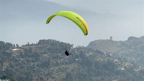 paragliding takeoff preparation