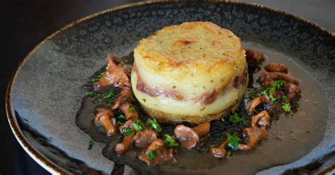 Parmentier de canard confit aux champignons