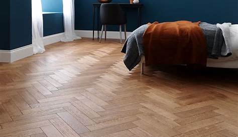 Parquet floor in bedroom stock image. Image of lamp