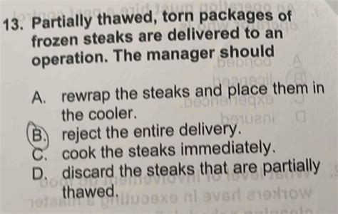 partially thawed torn packages of frozen steaks