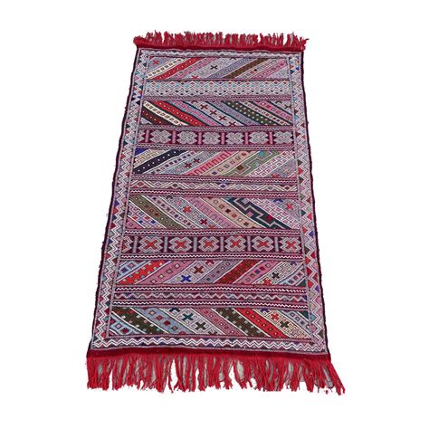 www.friperie.shop:pastel tribal rug
