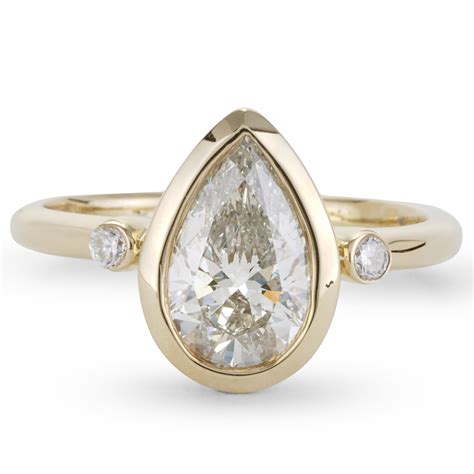pear shaped bezel set engagement rings