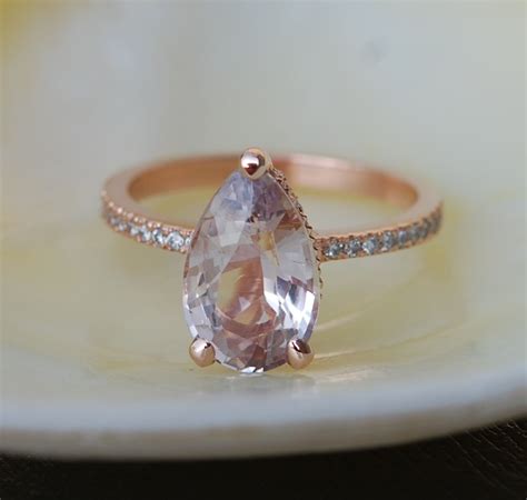 pear shaped peach sapphire engagement rings