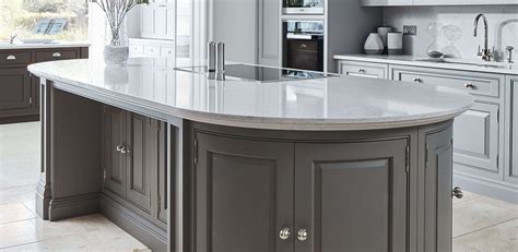 Gloss pearl grey creates a kitchen feel spacious Symphony kitchen