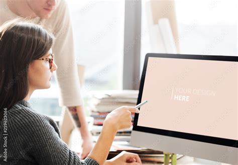 people looking at computer screen