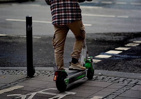 person riding electric scooter with awareness
