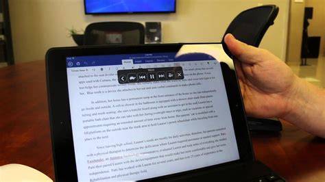 Image of a person using a screen reader to read a Word document