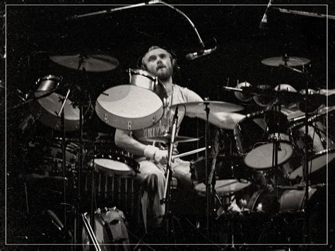 Phil Collins: The Rhythm Master Behind Iconic Drum Performances