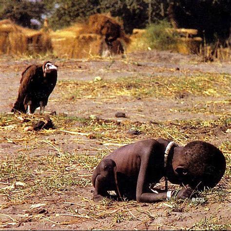 photo of african child and vulture